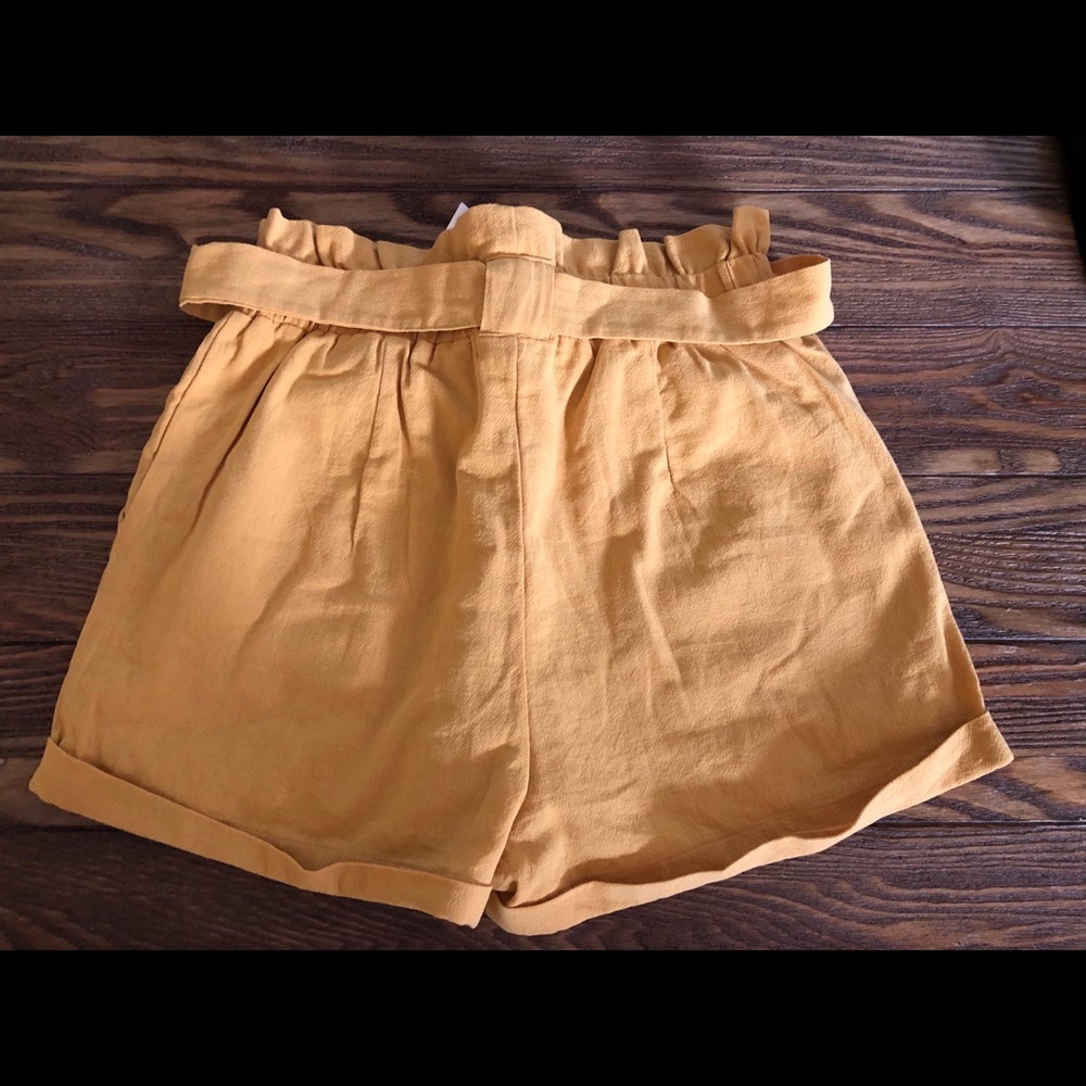 New with tags. Lined shorts with tie.